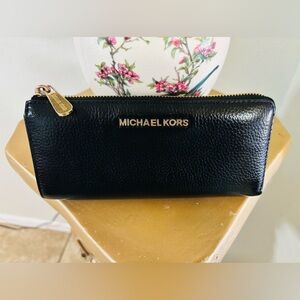 Michael Kors Black Leather Clutch with Gold Details, Pebbled Leather.